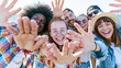 © Bonsales - Diverse group of smiling friends reaching hands forward, showing happiness, togetherness, and youth in a bright outdoor setting