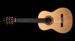 © MdZalal - Professional classical acoustic guitar isolated on deep black background showcasing refined luthier skills and wood texture details view.