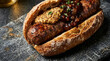 © Shabnaz - Gourmet sausage in a rustic bun with mustard and onion relish.
