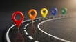 © Lamduan - Journey progress and future goals represented by colorful markers on a winding road path for business growth and life strategy planning.