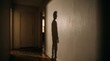 © design - Creepy silhouette shadow of a person on a wall in a dark and eerie haunted corridor