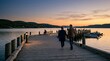 © Feliks - Couple walking on pier at sunset, holding hands, romantic evening by the lake
