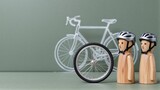 Wooden cyclist figures with helmets stand beside a real bike, framed by bicycle silhouette.