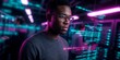 © Rifqi - focused black male programmer wearing glasses looking at code screen overlay in server room with neon light, concept for software development, cyber security and cloud computing