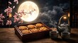 © MASUD - Traditional mooncakes served with tea during the beautiful mid autumn festival celebration under a bright full moon