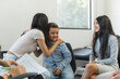 © STOCKEROcr - Children demonstrating support, comfort, and togetherness during group therapy