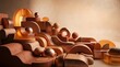 © Robson - Collection of abstract geometric 3D shapes featuring translucent amber glass, matte terracotta clay, and polished copper spheres arranged in a tier, d