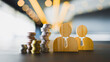 © sommart - Wooden human figures with money coins stack. Human resources management, team investment, payroll budget, financial planning concept.