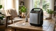 © Yusri - Portable oxygen concentrator machine on a wooden table in a living room