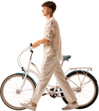 Side view of young man walking bicycle isolated on transparent background. Concept of pedestrian mobility, weekend leisure, sustainable lifestyle.