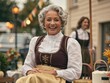 © Ivan - Mature woman celebrating oktoberfest wearing traditional dirndl costume