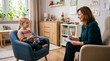 © GrayFrog - Smiling young girl holding a small toy while talking happily to her therapist in a bright office.