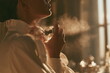 © Ackbara Studio - Elegant woman spraying luxury perfume in warm golden light, premium fragrance and beauty concept for cosmetic, skincare and fashion campaigns.