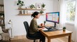 © Ednardo - Home Office Serenity: A woman works diligently at her home office desk, surrounded by plants and natural light, creating a productive and peaceful work environment.