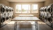© Justlight - Large RV park laundry room viewed in medium shot highlighting multiple dryers and communal folding tables with natural light filtering through large open windows.