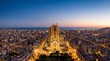 © StockPoly 3D - Aerial view of Barcelona city at sunset. Famous cathedral illuminated in urban landscape.
