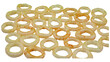 © grapixClarity - Scattered pile of crispy, golden-brown onion ring snacks with a porous texture, arranged on a plain white background