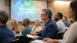 © Friedbert - Adult Learner Concentrates in a Modern University Lecture