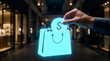 © dhiyaulhaq - Hand adding digital currency coin into shopping bag hologram representing online commerce and payment technology
