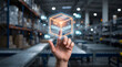 © dhiyaulhaq - Futuristic holographic supply chain technology concept featuring digital package logistics network in modern warehouse environment