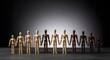 © HariBudi - Diverse wooden mannequin figures holding hands together symbolizing unity and equality