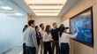 © Rassen - Diverse business professionals analyzing global data on a large digital screen in a modern conference room during a strategic company meeting