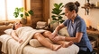 © tangmo.pa - Therapist performing lymphatic drainage massage on a client's leg in spa.