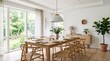© RK graphics - Modern light filled dining room with oak table and chairs.