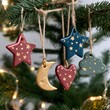 © Nan sarin - AI generator images of ceramic ornaments with gold details in the shapes of stars, moons, hearts, clouds, lightweight to decorate a modern, elegant Christmas tree in ceramic with a modern and elegant