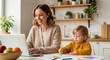 © Alexandr Peers - Mother balances remote employment with parenting and childcare, building a flexible career alongside family care through freelance work and self-employment for financial independence