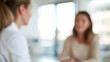 © Nova Zigres - Blurred Medical Consultation Between Physician and International Traveler in Modern Clinic