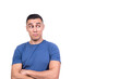 © Iván Moreno - Man with his arms crossed looking aside with distrust