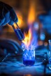 © Iftikhar alam - Students conduct a chemistry experiment involving flame and colorful liquid in a laboratory setting during a class session