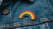© IbragimovN - Rainbow pin on denim jacket celebrating diversity and inclusion