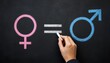 © Syed - Human hand drawing a white equal sign between colorful pink female and blue male gender symbols on dark chalkboard background