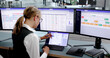 © Andrey Popov - Young Corporate Lawyer Analyzing Ownership Structure Chart On Laptop