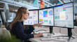 © Andrey Popov - Young Financial Analyst Studies Data On Desktop