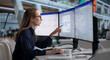 © Andrey Popov - Young Marketing Manager Designs Personalized Email Campaigns