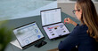 © Andrey Popov - Young Woman Uses Dual Touchscreen Laptop Managing Rental Property Portfolio
