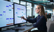 © Andrey Popov - Young Woman Uses Computer To Analyze Business Workflow