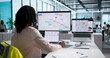 © Andrey Popov - Woman Analyzes Crime Data Charts On Desktop
