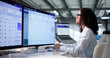 © Andrey Popov - Woman Reviewing Confidential Compliance Case Reports Using Software Dashboard