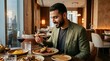© mashimara - Man enjoying a gourmet meal with wine in a sophisticated restaurant setting