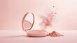 © Lumina Masterpieces - Pink powder exploding from a makeup compact on pink background. Beauty product advertisement.