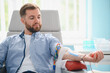 © Serhii - Man donating blood for charity in medical clinic
