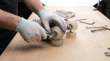 Gloved hands using a wrench to repair or change wheels on a roller skate