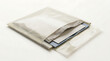 © Mustafuzur - Padded shipping envelope containing documents on a plain off-white surface