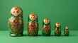 © Анастасия Калинина - Colorful russian matryoshka dolls nesting on green background