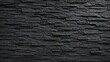 © Anuyut - Black stacked slate stone wall texture background modern dark stone veneer cladding pattern
