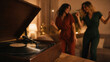 © DAndreev - Vintage Record Player with Two Women Dancing at Home